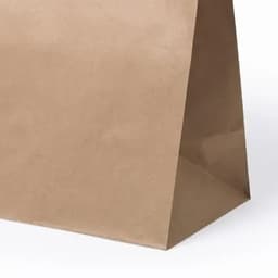 A brown paper bag with a flat base and a smooth texture, suitable for carrying various items.