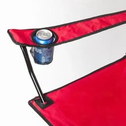 A red camping chair with a black frame and a mesh cup holder designed to hold a beverage can.