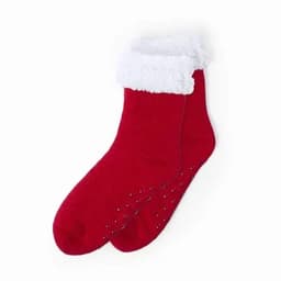 A pair of red socks with a fluffy white cuff and non-slip dots on the sole.