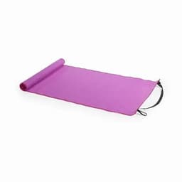 A yoga mat in vibrant purple, rolled out flat with a black strap for easy carrying.
