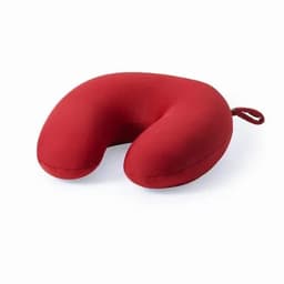 A red U-shaped travel pillow with a fabric cover, featuring a loop for easy carrying.