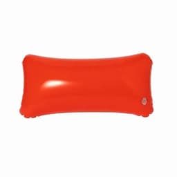 A bright red inflatable pillow featuring a rounded rectangular shape and a small logo on one side.
