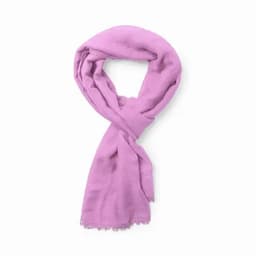 A pink scarf elegantly draped, featuring a soft texture and fringed edges.