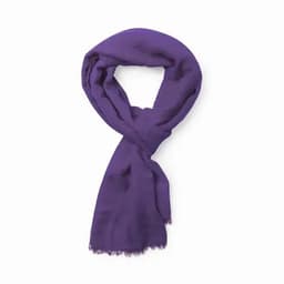 A purple scarf draped elegantly, featuring a soft texture and fringed edges.