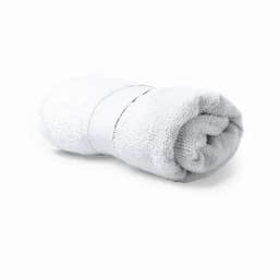 A rolled, white towel secured with a band. The towel appears soft and plush in texture.