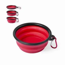 A collapsible pet bowl in red and black with a carabiner for attachment. It features a layered design.