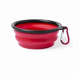 A red collapsible bowl with a black rim, featuring a carabiner for attachment.