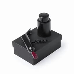 A black drink bottle and corkscrew sit atop a black gift box, featuring a sleek and modern design.