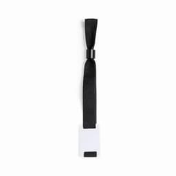 A black fabric wristband with a tied bow and a blank rectangular tag for customisation.