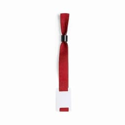 A red wristband made of fabric with a black fastening, featuring a blank rectangular tag for customisation.