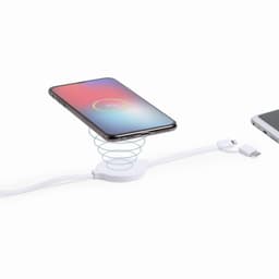 A wireless phone charger in white with a coiled design, featuring a smartphone positioned above it.