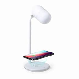 A modern white desk lamp with a wireless charging pad for a smartphone. The lamp has a sleek, minimalist design.