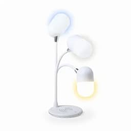 A lamp with three flexible arms, featuring white lamp shades and a wireless charging base in a sleek design.