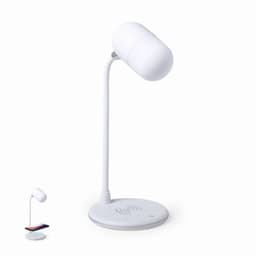 A desk lamp with a white body and a rounded shade, featuring a wireless charging base.