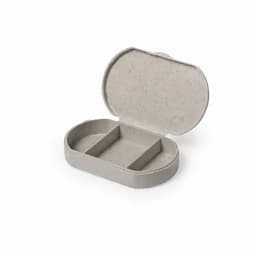 A grey, oval-shaped container with a hinged lid, featuring two compartments inside.