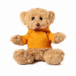 A teddy bear with brown fur wearing an orange hoodie, sitting upright. It has small black eyes and a cute expression.