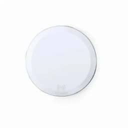 A wireless charging pad in white, featuring a seamless circular design and a brand logo on the underside.
