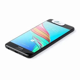 A smartphone with a vibrant display, featuring a round white logo on the top, angled on a flat surface.