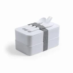 A two-tiered lunchbox in white, secured with a grey strap, includes a fork and spoon on top.