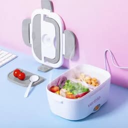 A food container with compartments, featuring a white exterior and a grey lid, surrounded by fresh ingredients on a pastel-coloured background.