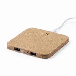 A charging pad in a natural cork finish with two USB ports and a white charging cable.