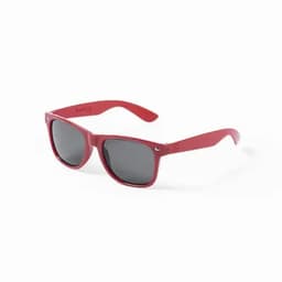 A pair of red sunglasses with black lenses, featuring a simple design and logo on the side.