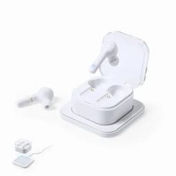 A pair of white wireless earbuds placed next to their charging case, with a charging cable visible.