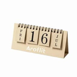 A tabletop calendar with a beige base featuring a spiral binding, displaying the date '16' and the month 'July'.