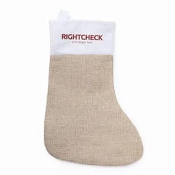 A beige Christmas stocking with a white top, featuring a logo at the top.