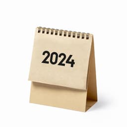 A desk calendar with a spiral binding, featuring a single page marked "2024" in bold black numbers.