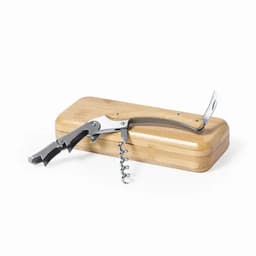 A corkscrew with a wooden handle resting on a rectangular bamboo box. The corkscrew features a metal spiral and lever.