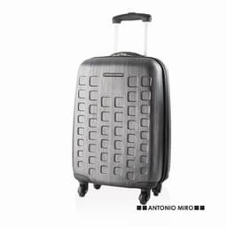 A suitcase with a sleek, metallic grey finish, featuring a textured grid pattern and a retractable handle.