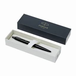A black pen with a sleek design, positioned inside a white box with a black outer sleeve and a logo.