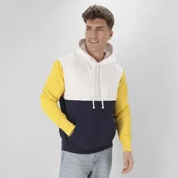 A hoodie featuring a white upper section, yellow sleeves, and a navy lower section. The model is wearing it and smiling.