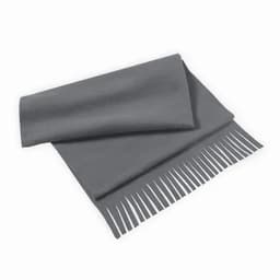 A grey blanket with a textured finish and fringed edges, folded neatly on a surface.