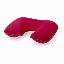 A travel neck pillow in a deep red colour, featuring a U-shaped design. It has a soft, plush surface.