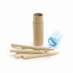 A set of coloured pencils in a cardboard tube with a blue sharpener beside them. Pencils have various tip colours.