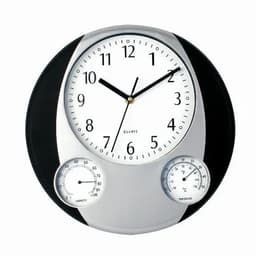 A stylish wall clock with a silver and black design, featuring large numbers, and dials for humidity and temperature.