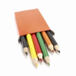A set of six coloured pencils in a brown holder, featuring red, yellow, green, black, and natural shades.