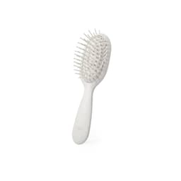 A hairbrush with a white handle and bristles, featuring a textured surface and a logo on the handle.