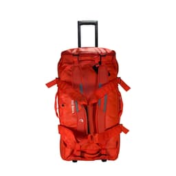 A red rolling duffel bag with multiple straps and a retractable handle, featuring a logo.