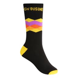 A pair of black socks featuring a colourful geometric pattern with yellow, pink, and orange accents and a logo.