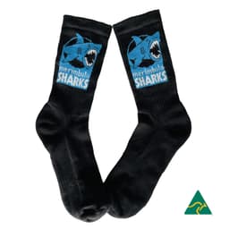A pair of black sports socks featuring a blue shark logo and design.