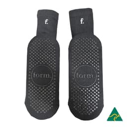 Black Crew Grip socks featuring a textured grip pattern and branding. Ideal for comfortable wear.