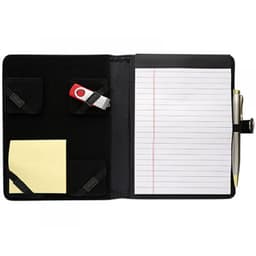 A5 compendium featuring black fabric, with pockets for a USB drive and a pen, and includes lined notepad and sticky notes.