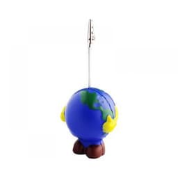 A blue and green globe-shaped card holder with yellow hands and brown feet, attached to a metal clip.