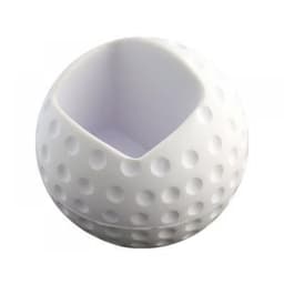 A white golf ball shaped mobile phone holder with a smooth opening at the top and a textured surface.