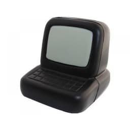 A black stress relief computer shaped product with a screen and keyboard design. It has a simple, compact form.