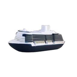 A stress relief toy shaped like a cruise ship, featuring black and white colours with fine details on the hull.