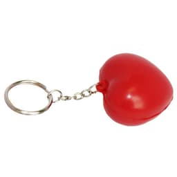 A red heart-shaped keyring with a metal chain attachment. It has a smooth, shiny finish.